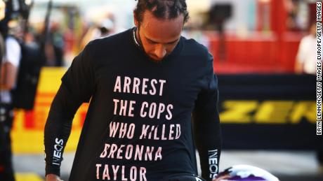 Hamilton wears a shirt in tribute to Taylor at Sunday's GP. 