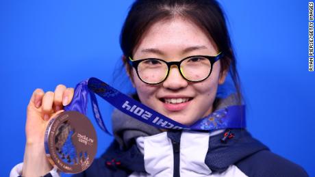 Shim celebrates her bronze medal in the women's 1,000m short track speed skating at the 2014 Winter Games in Sochi.