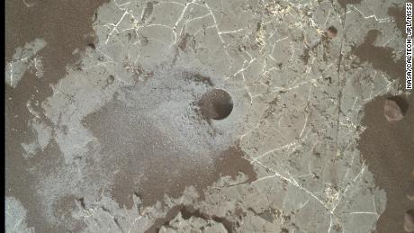 The image shows a borehole created by Curiosity on Mars' Vera Rubin Ridge. 