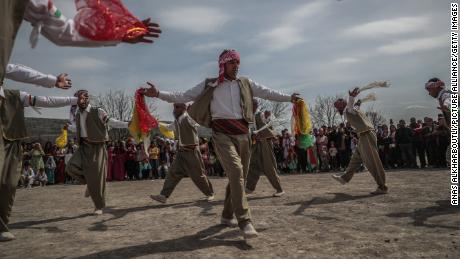 Syrian Kurds celebrate the Nowruz holiday in the city of Afrin on March 21.