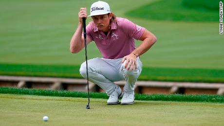 Smith puts his putt on the fourth hole during the final round of the Players Championship.
