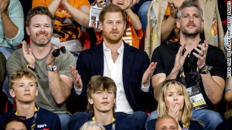 Prince Harry watches weightlifting at the Invictus Games.