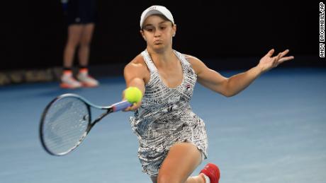 Barty performs a forehand return against Danielle Collins of the USA in the women's singles final at the Australian Open tennis championship on Saturday, January 29, 2022.
