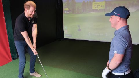 Prince Harry takes golf lessons from Lawlor.