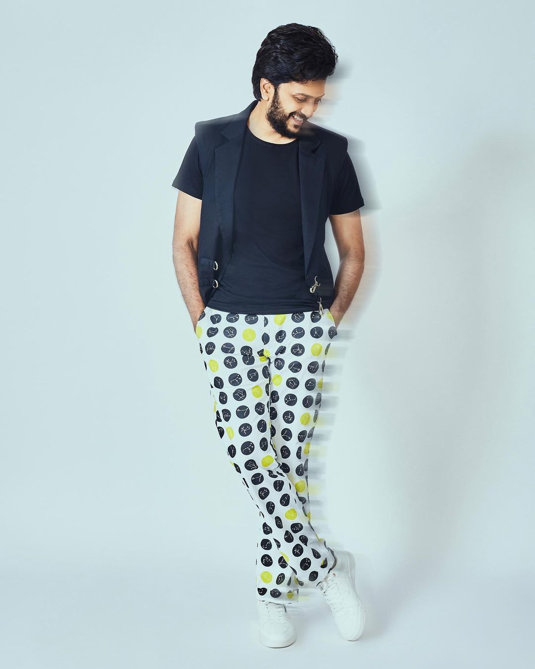 Riteish Deshmukh adds a pop of color to his ensemble designed by Crimsoune Club.