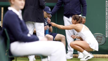 British Jodie Burrage helps unwell ball boy with candy during first round Wimbledon match