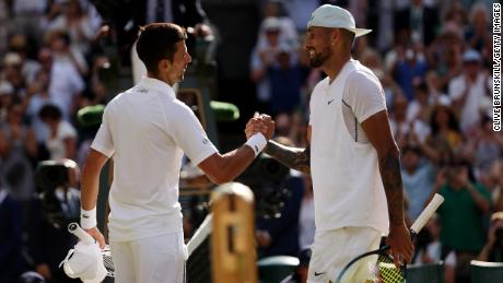 Djokovic and Kyrgios shake hands after the men's singles final at Wimbledon.