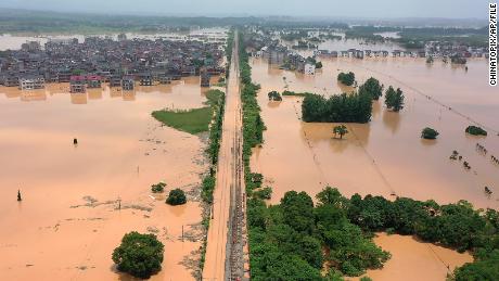 China weathers summer of extreme weather as record rains and scorching heatwaves wreak havoc