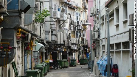 Air conditioners line a narrow alley in central Singapore.