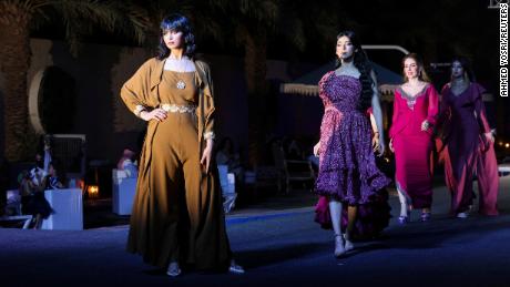 Models showcase the latest collection at Jimmy Fashion Show, where local and international fashion designers launched their collections on Friday in Riyadh, Saudi Arabia. Saudi designers had problems in the past before easing restrictions in the kingdom and had to travel abroad to showcase their work.