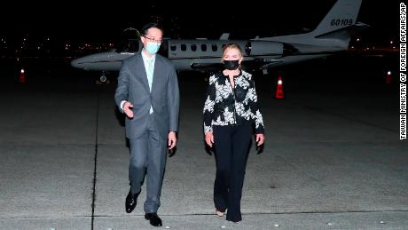 U.S. Senator Marsha Blackburn, R-Tenn. walks with Douglas Yu-Tien Hsu, director general of Taiwan's Ministry of North American Affairs, as she arrives on a plane in Taipei on Thursday.