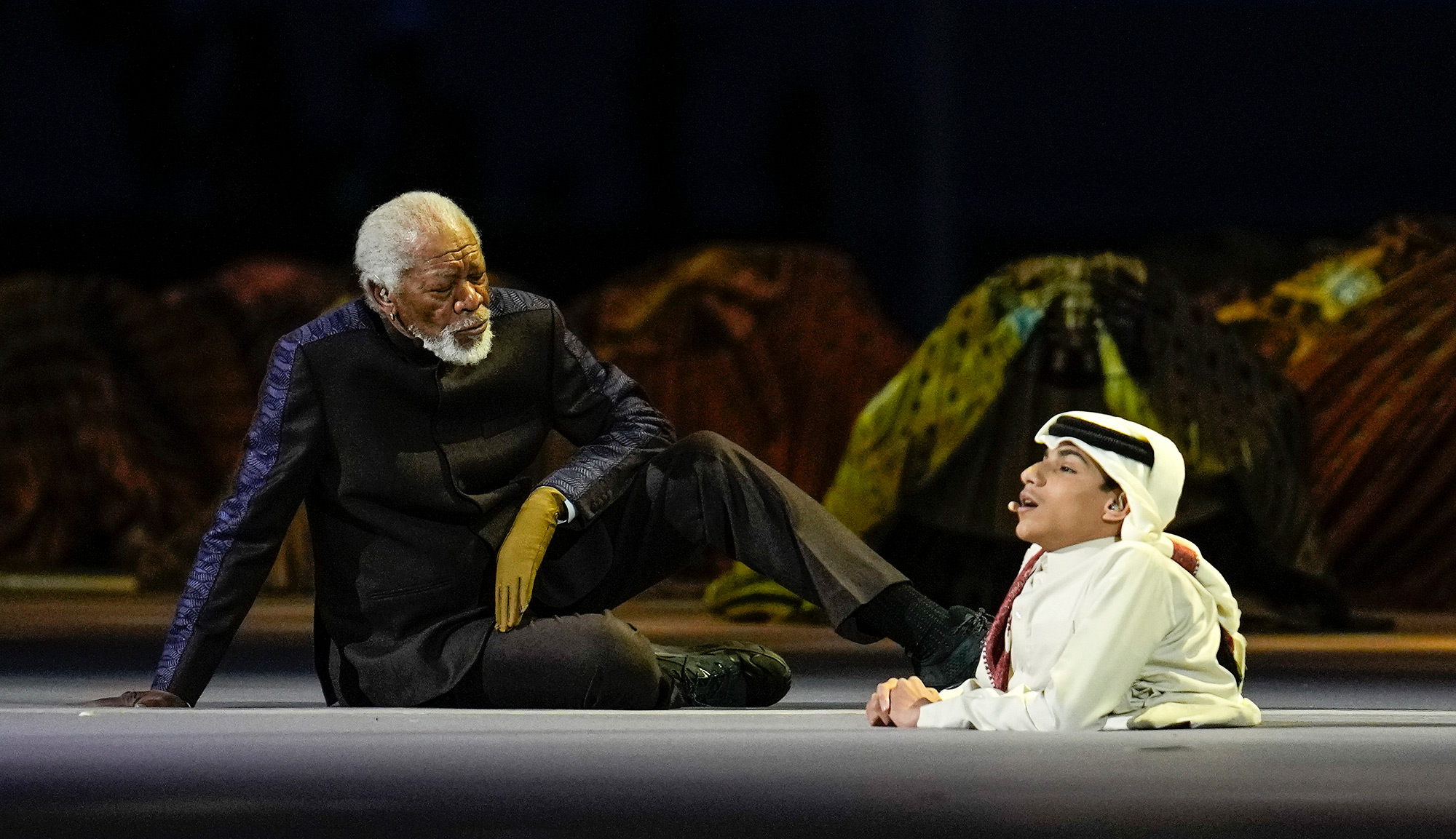 Actor Morgan Freeman performs with Qatari YouTuber Ghanim al Muftah.
